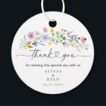 Romantic Boho Garden Wildflower Thank You Favour Tags<br><div class="desc">Add a heartfelt finishing touch to your wedding favours with these watercolor wildflower thank you tags. Featuring a spray of hand-painted blooms in pink, purple, yellow, and blue with elegant script that reads “thank you, ” this round tag is personalized with your names and wedding date. Perfect for attaching to...</div>