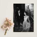 Romantic Christmas Black and White Newlywed Photo Holiday Card<br><div class="desc">Celebrate your first holiday season as newlyweds with this elegant black & white photo holiday card. The timeless black tie setting, captured in chic and romantic tones, evokes the sophisticated joy of your first Christmas together. Featuring two-sided photos and unique calligraphy, this minimalist design is perfect for couples looking for...</div>