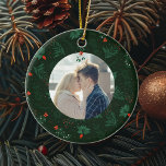 Romantic Christmas Mistletoe Custom Couple Photo Ceramic Ornament<br><div class="desc">This romantic Christmas ornament features your personalized holiday photo with a festive mistletoe and red bow hanging over your custom kissing couple photograph. Add your own newlywed or engagement picture in the centre of this beautiful green botanical holiday pattern. Customize this commemorative keepsake on the back in red and green...</div>