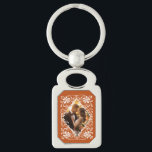Romantic Couple Photo Burnt Orange Keychain<br><div class="desc">This metal keychain has a lovely watercolor design with a white floral border on a warm,  earthy orange backdrop. You can swap out the picture with one of your own. It's a great choice for a special gift to help a loved one hold on to happy memories.</div>