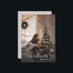 Romantic Cozy Couple Christmas Holiday Photo<br><div class="desc">A romantic Christmas photo card with a modern, cozy style — perfect for couples who love a dark-neutral holiday aesthetic. Soft twinkle lights, a decorated tree, and understated festive accents frame your photo with timeless charm. Replace the sample image with your own favourite portrait, personalize your names and year, and...</div>