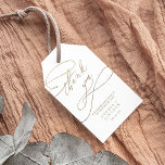Romantic Gold Calligraphy Flourish Thank You Favou Gift Tags<br><div class="desc">These romantic gold calligraphy flourish thank you favour gift tags are perfect for a simple wedding. The modern classic design features fancy swirls and whimsical flourishes with gorgeous elegant hand lettered faux champagne gold foil typography. Personalize the labels with your names and the date. Change the wording to suit any...</div>
