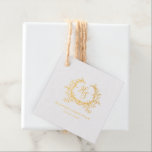 Romantic Gold Monogram Crest Wedding Favour Tags<br><div class="desc">Celebrate your wedding in style with these charming real gold foil favour tags. The design features a beautiful monogram set within a delicate wreath crest, creating a sophisticated and romantic appearance. These tags are ideal for adding a personalized touch to your wedding favours, whether it's candies, small gifts, or party...</div>