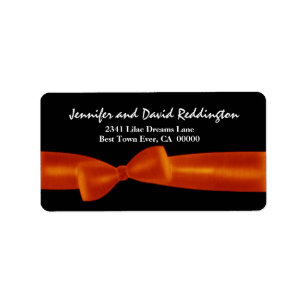 Romantic Orange Bow on Black Background Label