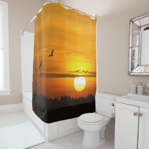 Romantic orange sunset with birds photo
