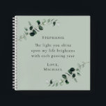 Romantic Quote Personalized Sage Eucalyptus Notebook<br><div class="desc">The Light You Shine Romantic Quote Personalized Eucalyptus Sage Green Notebook... The romantic inspirational saying on our custom design sage square notebook reads "The light you shine upon my life brightens with each passing year" in trendy serif typography. Bordering this text are watercolor eucalyptus branches in shades of sage and...</div>