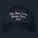 Romantic Quote "The best love stories never end,"  Embroidered Hat<br><div class="desc">This navy cotton cap features the romantic quote "The best love stories never end, " elegantly embroidered to capture its timeless sentiment. The adjustable strap ensures a comfortable fit for all sizes, making it a versatile choice. Crafted from durable cotton, this cap combines style with a meaningful message, making it...</div>