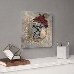 Romantic Rose Wreath Feather Wedding    Square Wall Clock<br><div class="desc">A romantic bouquet of roses on an elegant gold flourish wreath where you can customize it on a shiny gold backdrop with silver feathers creating stylish classy vibes. Perfect for any wedding,  engagement party.  Part of the stylish trendy wedding gifts collection.</div>