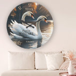 Romantic Swans Wedding Round Clock<br><div class="desc">Wall clock featuring a painting of two swans. The classic Roman clock numbers can be deleted if you do not need them. As swans are known to stay together for their entire life, this a beautiful gift for a wedding or anniversary.</div>