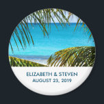 Romantic Turquoise Tropical Beach Wedding Magnet<br><div class="desc">Wedding magnet personalized with your names and date. Designed with a beautiful photograph of a turquoise tropical beach with large green palm fronds framing the scene.</div>