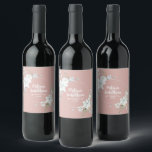 Romantic watercolor white flowers wedding custom wine label<br><div class="desc">Elegant and romantic customizable wine labels for your wedding reception, featuring a beautiful bouquet of white gentle watercolor flowers, over a classy pastel pink background. Easily edit the template fields to add the bride and groom names in a modern white script, and your wedding date in a stylish all-caps font....</div>
