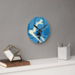 Ron Weasley Patronus Painting Round Clock<br><div class="desc">Step into the Wizarding World with this dynamic Ron Weasley design, capturing a powerful moment of magic in motion. Ron is mid-cast as a luminous Patronus bursts forward in a brilliant sweep of light. The glowing spell contrasts beautifully with the cool blue tones of the castle interior, creating a striking,...</div>