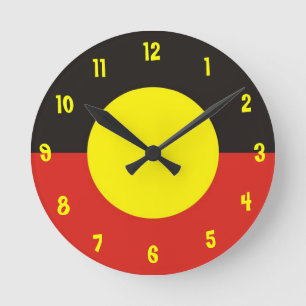 Ronde horloge indigène de drapeau