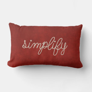 rope simplify text on red lumbar pillow