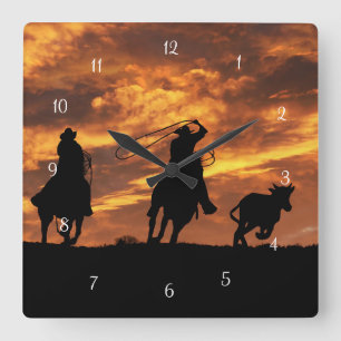 Roping Cowboys in the Sunset Square Wall Clock