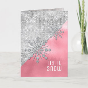 Rose avec la carte de Noël argentée de flocons de