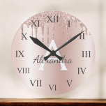 Rose Gold - Blush Pink Glitter Metal Monogram Name Large Clock<br><div class="desc">Rose Gold - Blush Pink Faux Foil Metallic Sparkle Glitter Brushed Metal Monogram Name and Initial Luxury Wall Clock. This makes the perfect sweet 16 birthday,  wedding,  bridal shower,  anniversary,  baby shower or bachelorette party gift for someone that loves glam luxury and chic styles.</div>