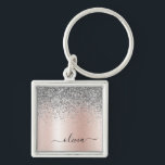 Rose Gold - Blush Pink Silver Glitter Monogram Keychain<br><div class="desc">Rose Gold - Blush Pink and Silver Faux Foil Metallic Sparkle Glitter Brushed Metal Monogram Name Keychains (Key Chain). This makes the perfect sweet 16 birthday,  wedding,  bridal shower,  anniversary,  baby shower or bachelorette party gift for someone that loves glam luxury and chic styles.</div>