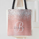 Rose Gold Brushed Metal Glitter Monogram Name Tote Bag<br><div class="desc">Easily personalize this trendy chic tote bag design featuring pretty silver sparkling faux glitter on a rose gold brushed metallic background.</div>