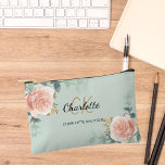 Rose gold floral green name monogram accessory pouch<br><div class="desc">Green background,  black and golden text. Decorated with watercolored rose gold roses,  eucalyptus greenery and golden sprigs. 
Personalize and add your first name,  monogram initials and full name.</div>