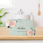 Rose gold floral greenery name monogram dopp kit<br><div class="desc">A green coloured background,  black and golden text. Decorated with watercolored rose gold roses,  eucalyptus greenery and golden sprigs. 
Personalize and add your first name,  monogram initials and full name.</div>