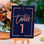 Rose gold frame script navy blue table number<br><div class="desc">rose Gold typography on customizable navy blue rose gold half frame,  and faux rose gold geometric stripes chic table number wedding ,  perfect for elegant,  beach wedding, </div>