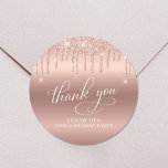 Rose Gold Glitter 70th Birthday Party Thank You Classic Round Sticker<br><div class="desc">Chic sticker for your 70th birthday party correspondence and party favours featuring "Thank You" in elegant white calligraphy script and rose gold faux glitter on a rose gold faux foil background.</div>