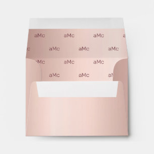 Rose gold monogram wedding envelope
