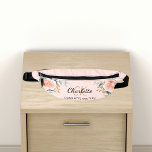 Rose gold pink floral greenery name monogram fanny pack<br><div class="desc">A rose gold,  pink coloured background,  black and golden text. Decorated with watercolored rose gold roses,  eucalyptus greenery and golden sprigs. 
Personalize and add your first name,  monogram initials and full name.</div>