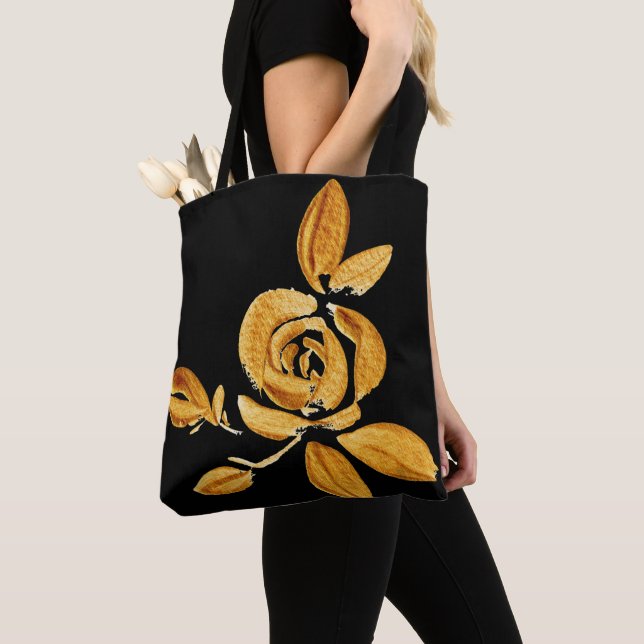 Rose or sur Sac fourre-tout noir (De près)