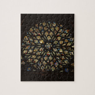 Rose window above the west door, with scenes depic jigsaw puzzle