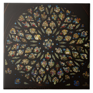Rose window above the west door, with scenes depic tile