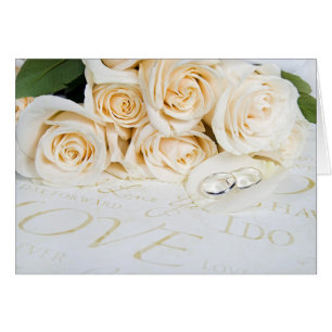 roses blanches et anneaux mariages