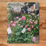 Roses Jigsaw Puzzle<br><div class="desc">This puzzle features a photo of a stall selling pink roses at a market in France.</div>