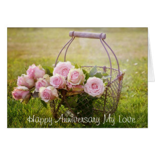 Roses roses dans un panier, élégante carte d'anniv