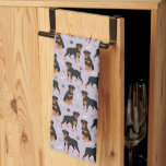 Rottweiler Dog Bones and Paws Kitchen Towel<br><div class="desc">Cute Rottweiler dogs sit and stand with black and tan coats with scattered dog bones and pawprints pattern.</div>