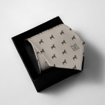 Rottweiler Dogs Pattern Monogrammed Tie<br><div class="desc">Fun Rottweiler dogs pattern on a classic beige background. Personalize with a monogram to make the perfect one of a kind gift.

Looking for a different color? No problem! Simply click the "Customize" button and select the background color of your choice.</div>