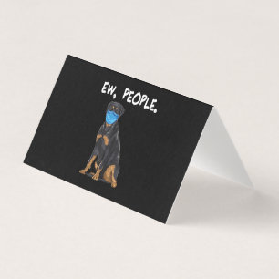 rottweiler quelques personnes chien portant un mas