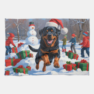 Rottweiler Running in Snow with Christmas Hat Kitchen Towel