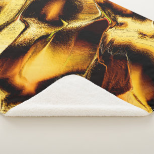 Rough golden orange dunes, with dark parts sherpa blanket