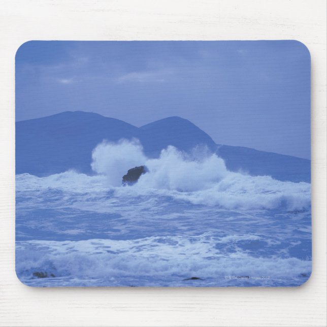 rough seas crashing against a rocky shore mouse pad (Front)