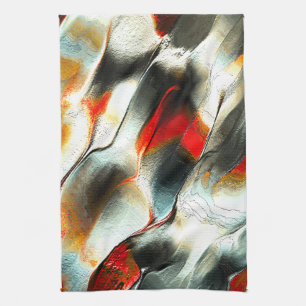Rough silvery rock over burning ember, intensity kitchen towel