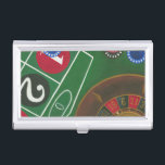 Roulette Table with Chips and Wheel Business Card Holder<br><div class="desc">The spinning wheel holds all the power on the roulette table, but the power of this painting is in the lifelike depiction of a casino scene. The green of the felt and the colour of the chips puts you at the table, waiting on your bet to pay off. Be sure...</div>