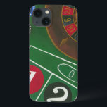 Roulette Table with Chips and Wheel iPhone 13 Case<br><div class="desc">The spinning wheel holds all the power on the roulette table, but the power of this painting is in the lifelike depiction of a casino scene. The green of the felt and the colour of the chips puts you at the table, waiting on your bet to pay off. Be sure...</div>