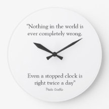 Round Clock with Paulo Coelho Quote