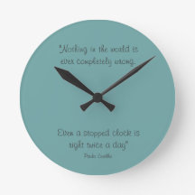 Round Clock with Paulo Coelho Quote