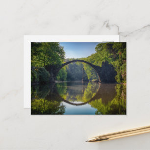 Round Grey Rock Bridge over a River in the Woods Postcard