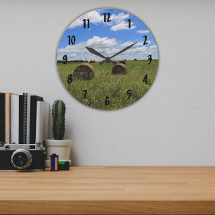 Round Hay Bales in a Farmers Summer Field Large Clock