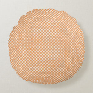 Round pillow with a peach and white gingham