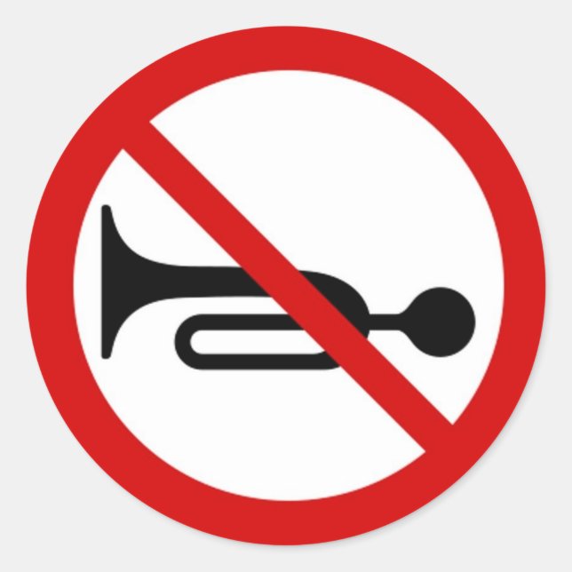 Round sticker with horn prohibited sign. (Front)
